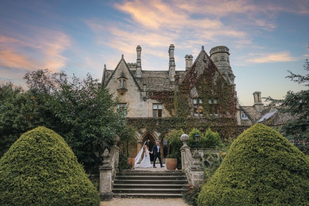 bride and groom at manor by the lake