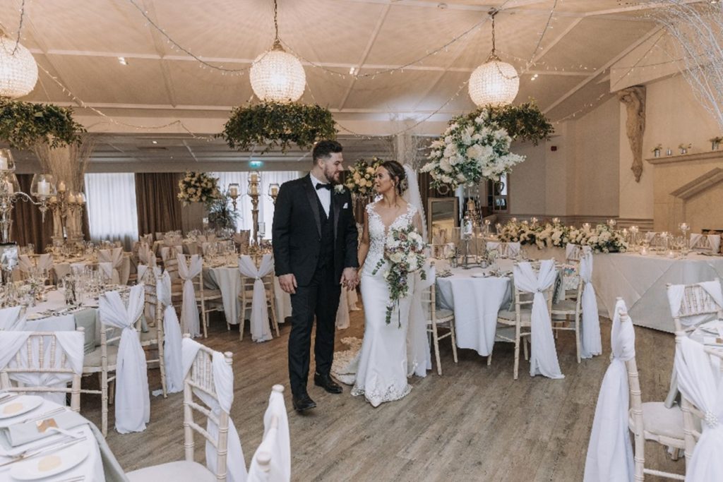 bride and groom ballroom at manor by the lake